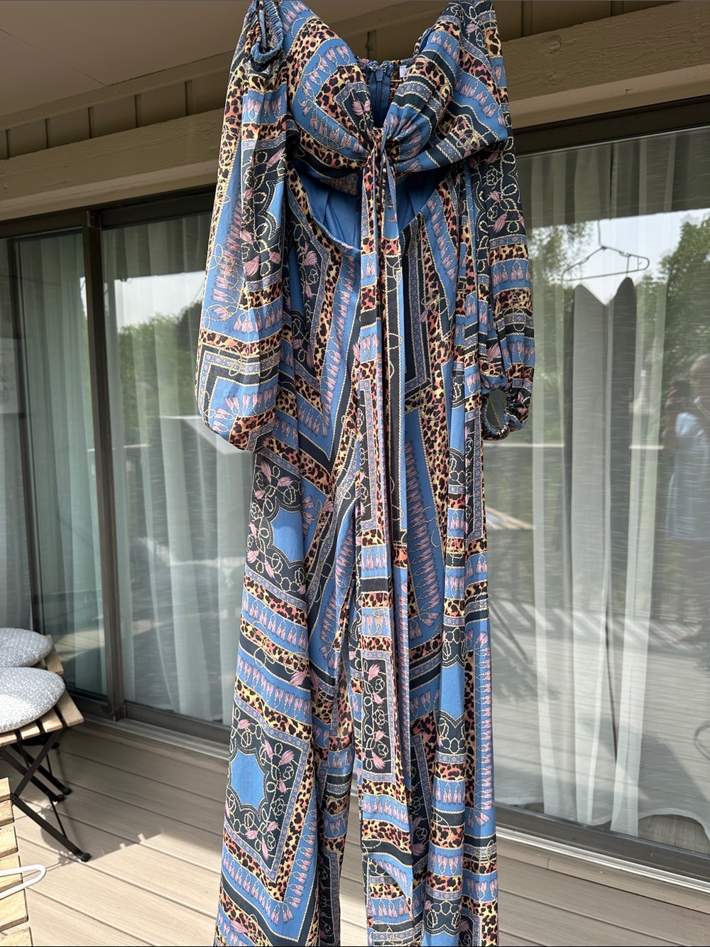 Fashion Nova Blue Patterned Jumpsuit with Tie Front and Leopard Accents